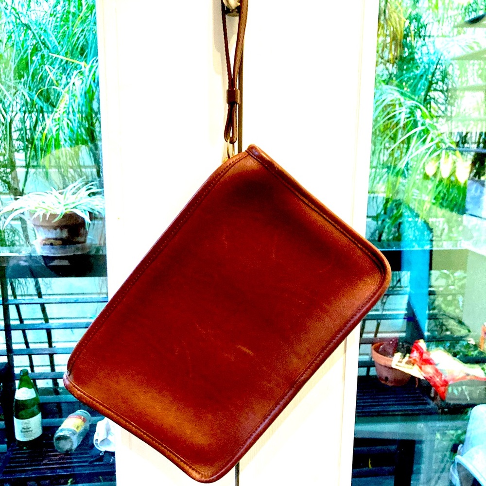 Woman’s Leather Wrist Clutch Bag by Coach